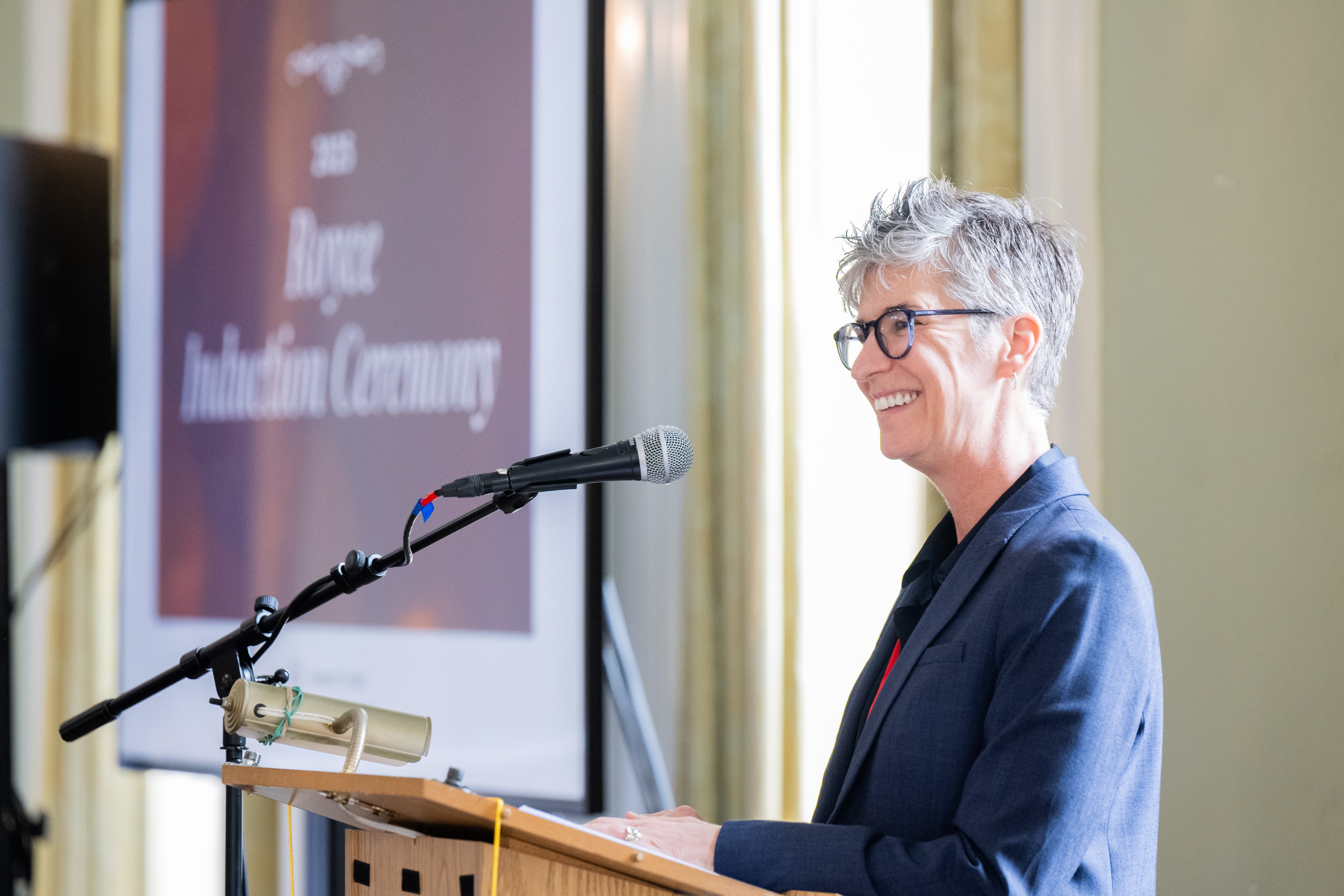 Mary Jo Callan speaking at podium