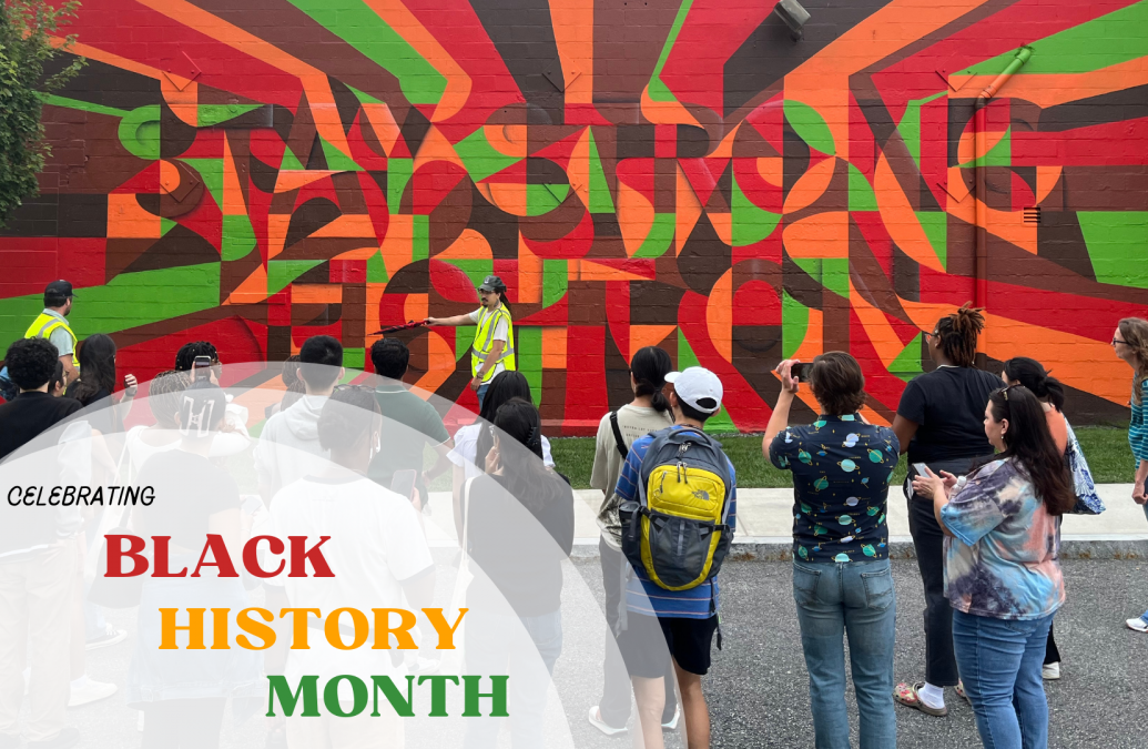 colorful wall mural with a group of students observing 