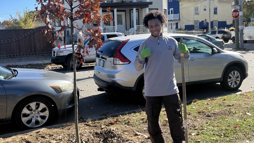 student planting trees