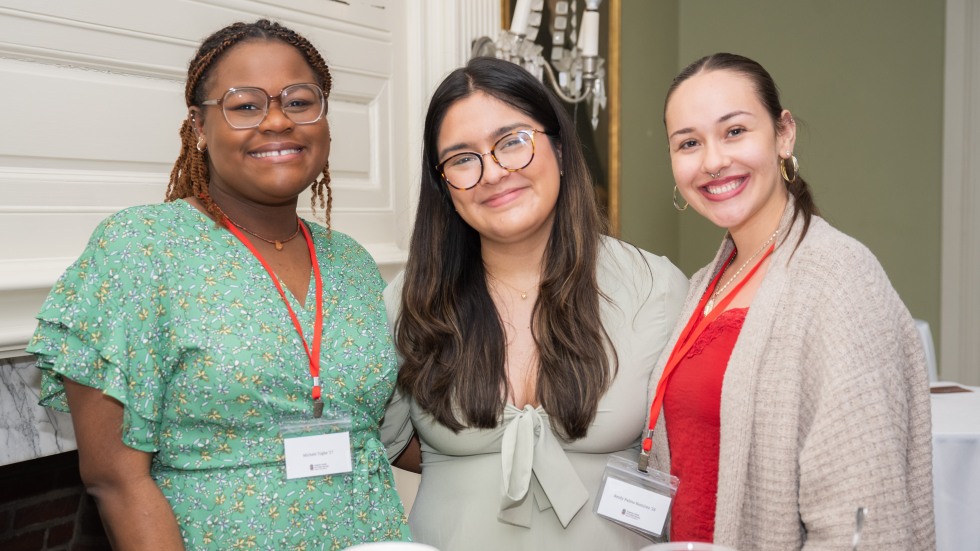 three students posing