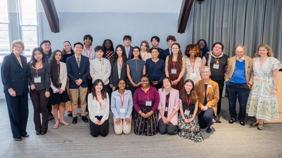 The 2026 Royce Fellowship cohort poses for a group photo with President Christina H. Paxson, Chuck Royce and Grace Argo at the Royce celebration.