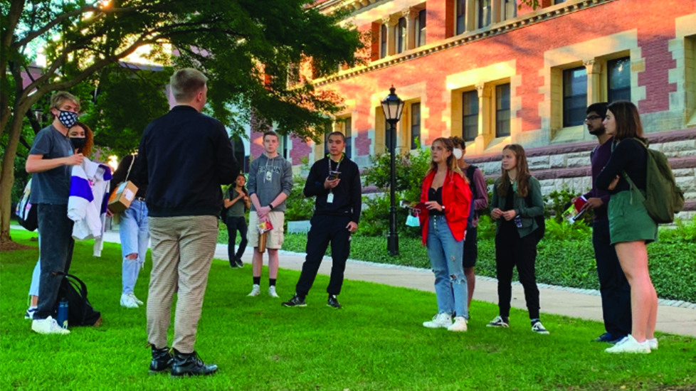 student giving a toup on campus