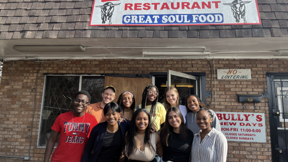 Students in front of Bully's Restaurant